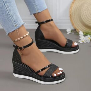 Shine bright in these glitter ankle strap wedge sandals – glam, height, and comfort in one chic pair.