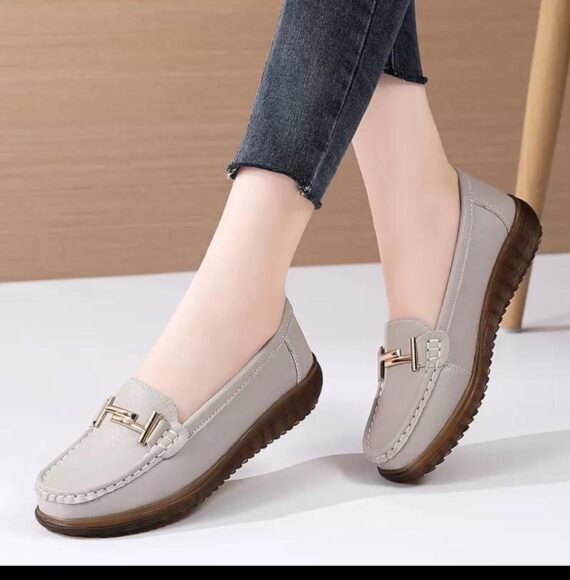 Classic moccasin-style slip-on loafers offering all-day comfort with timeless flair.