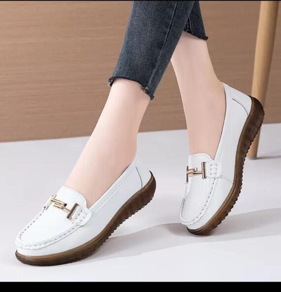 Classic moccasin-style slip-on loafers offering all-day comfort with timeless flair.