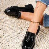 Step into timeless elegance with our Women's Patent Leather Loafers. Crafted from high-shine patent leather, these loafers feature a classic silhouette with a modern twist, offering a luxurious finish that instantly elevates your look. The slip-on design ensures effortless wear, while the cushioned insole and sturdy sole provide lasting comfort for all-day use. Perfect for the office, weekend brunch, or a chic casual ensemble, these loafers blend classic charm with contemporary polish for a truly versatile footwear essential.