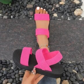 Brighten up your warm-weather wardrobe with our Pink Elastic Strap Sandals. Designed for both comfort and convenience, these sandals feature stretchy elastic straps that provide a secure yet flexible fit, adapting to your foot for all-day ease. The vibrant pink color adds a fun pop to any outfit, while the cushioned sole ensures lightweight support with every step. Whether you're heading to the beach, strolling through the city, or running errands, these sandals are the ideal blend of casual charm and practical comfort.