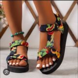 Add a playful touch to your warm-weather look with our Floral Platform Velcro Sandals. Designed with vibrant floral patterns and a chunky platform sole, these sandals bring a burst of personality to every step. The easy-to-use Velcro straps ensure a secure, adjustable fit, while the cushioned footbed offers comfort and support for all-day wear. Whether you're heading to a beach party, a casual day out, or a festival, these sandals combine style, function, and fun in one eye-catching package.
