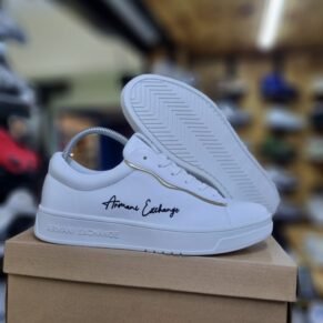 Step into contemporary style with Armani Exchange Sneakers — where streetwear-inspired design meets upscale detailing. Crafted with precision and comfort in mind, these sneakers feature a streamlined silhouette, breathable materials, and a cushioned sole for all-day wear. Branded with the iconic A|X logo, they bring a bold yet minimalist aesthetic that pairs effortlessly with jeans, joggers, or smart-casual looks. Whether you're heading to the city or keeping it casual, Armani Exchange Sneakers deliver the perfect mix of fashion and function.