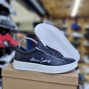 Step into contemporary style with Armani Exchange Sneakers — where streetwear-inspired design meets upscale detailing. Crafted with precision and comfort in mind, these sneakers feature a streamlined silhouette, breathable materials, and a cushioned sole for all-day wear. Branded with the iconic A|X logo, they bring a bold yet minimalist aesthetic that pairs effortlessly with jeans, joggers, or smart-casual looks. Whether you're heading to the city or keeping it casual, Armani Exchange Sneakers deliver the perfect mix of fashion and function.