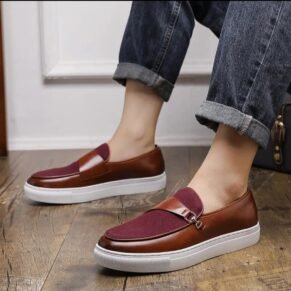 Elevate your footwear collection with the Burgundy Fusion Loafer—featuring a rich burgundy hue, premium leather construction, and a sleek silhouette that complements both formal and casual ensembles.