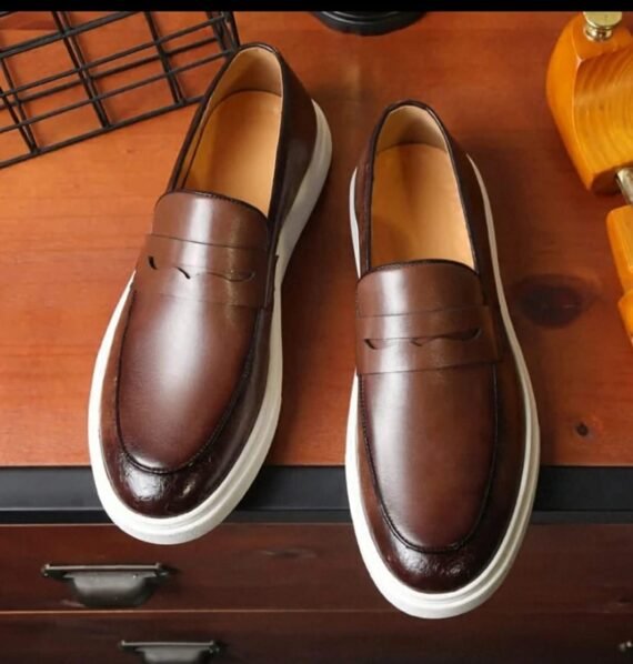 Elevate your ensemble with Pedro's Embossed Leather Loafers—featuring luxurious calf leather, traditional moccasin stitching, and a sleek silhouette suitable for various occasions.