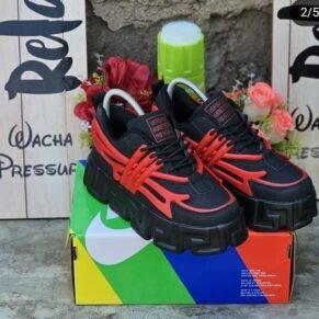 Sneakers in black and red Versace platform with a unique heel and platform sole, perfect for everyday wear.